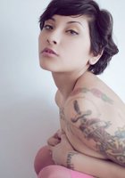 Привлекательная азиатка в розовых чулочках позирует обнажённой 14 фото Привлекательная азиатка в розовых чулочках позирует обнажённой 14 фото